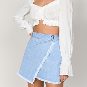 Wrap around denim mini skirt from Tobi. Size 28 (M)